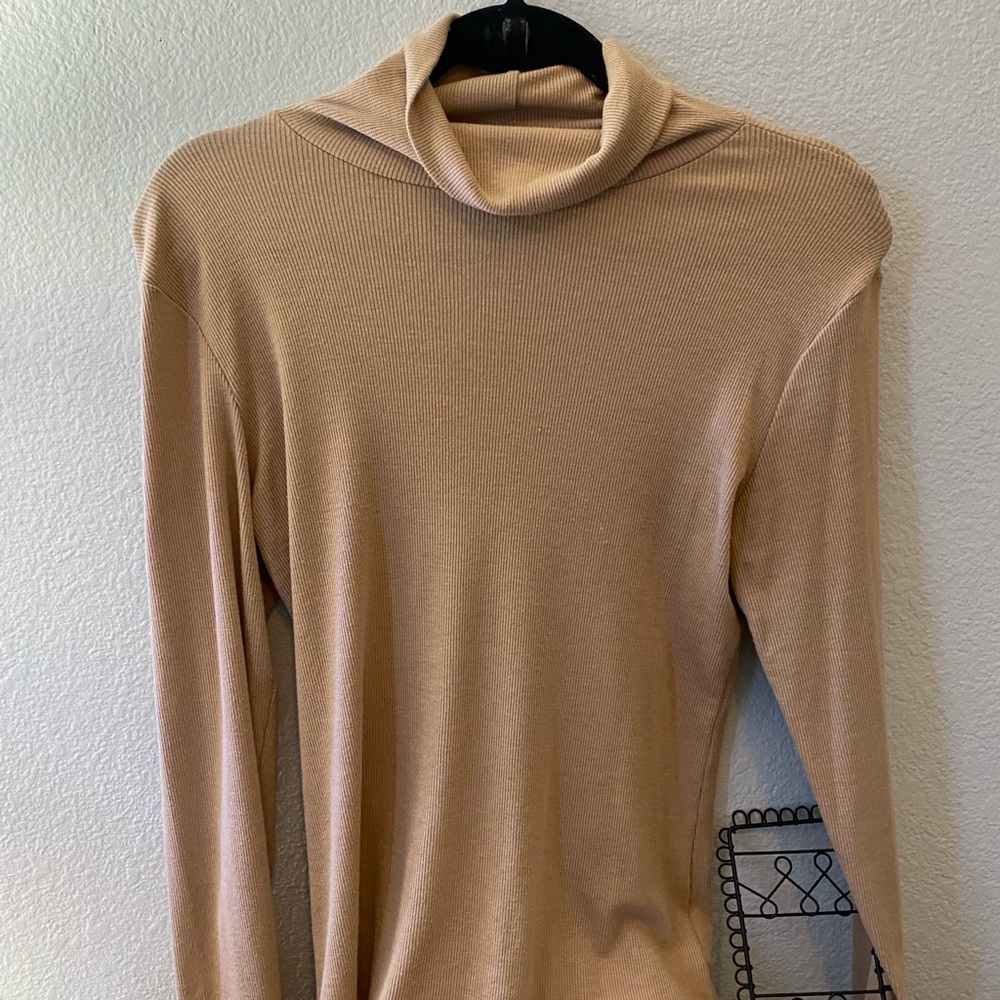 Naked light brown tan nude turtleneck sweater